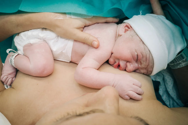 Doctor reviewing causes of preterm birth including bacterial infections and prenatal testing