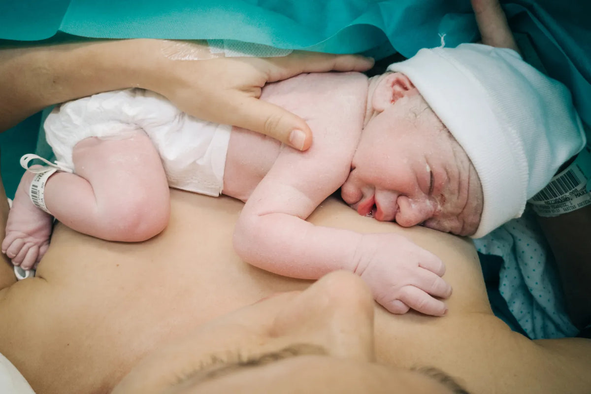 Doctor reviewing causes of preterm birth including bacterial infections and prenatal testing