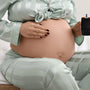 Pregnant woman reviewing gestational diabetes glucose test results with her doctor
